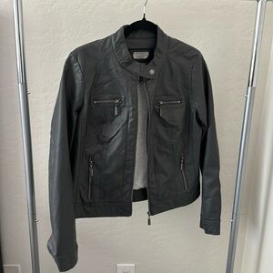 Polyvinyl faux fur lined jacket